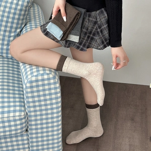 Women's ribbed knit mid-tube socks in gray-blue contrast colors and neutral tones