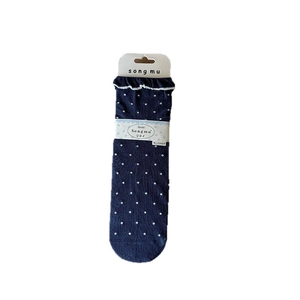 Chaussettes mi-hautes à pois bleu marine avec bordure à volants blancs et emballage