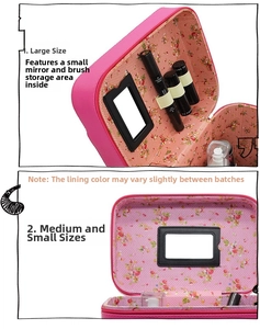 Pink PU makeup bag interior featuring floral lining, built-in mirror and brush slots