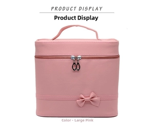 Pink large PU leather cosmetic bag with bow detail and double zipper closure