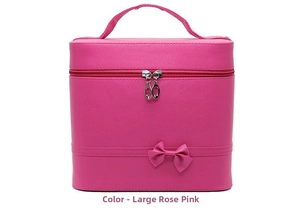 Macro view of rose red large makeup box with leather bow and double zipper handle