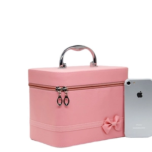 Pink PU leather makeup bag with metal handle and bow detail, large storage case