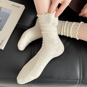 Japanese retro cream slouch socks with colorful speckles and ruffled edges for women