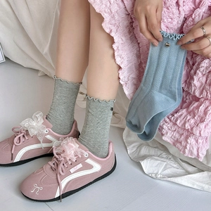 Mid-calf cotton socks with ruffle edge and silver button detail in soft gray and blue