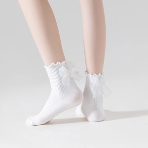 White Lolita ruffle socks with large mesh bows shown from a side view for girls