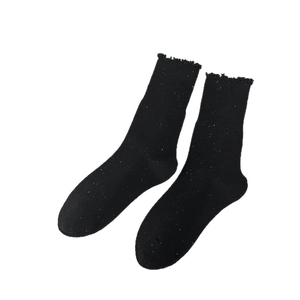 Japanese style black cotton crew socks with colorful speckles and ruffled edges
