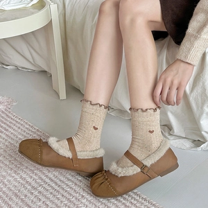 Brown Mary Jane plush shoes with beige heart socks in a cozy Japanese Mori style setting