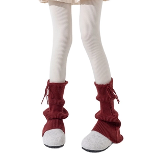 Japanese style red knit leg warmers with adjustable drawstring and ribbed texture