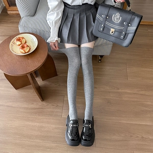 Japanese style grey over-knee socks paired with JK pleated skirt and platform shoes