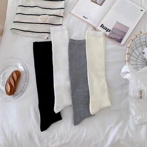 Classic cotton knee-high socks in black white grey and cream colors for school outfits