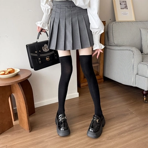 Classic school style outfit featuring black over-the-knee socks and glossy loafers