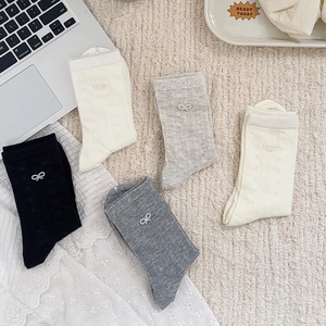 Bow-knot pearl crew socks set in black, gray, and beige with breathable mesh texture