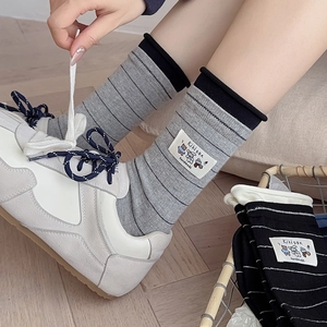 Women's striped mid-calf socks with cute bear label and rolled edges in casual style