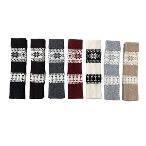 Sept paires de jambières tricotées Fair Isle avec motifs de flocons pour l'hiver
