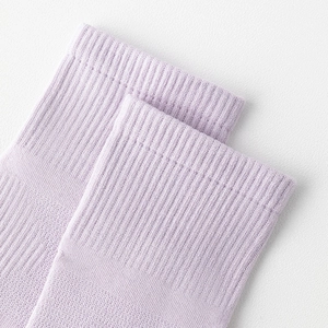 Close-up of lavender cotton five-toe socks featuring elastic ribbed cuff and fine knit texture