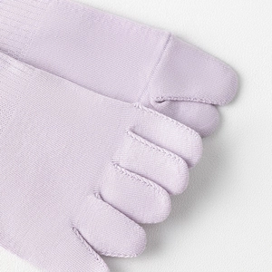 Close-up of light purple five-toe socks showing fine knit texture and toe separators