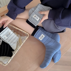 Women's cotton crew socks with minimalist stripes and fabric labels in Morandi colors