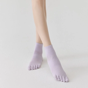 Detail of light purple ankle toe socks featuring breathable mesh and ribbed cuffs