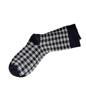Classic black and grey checkered mid-calf socks with high-quality knit texture