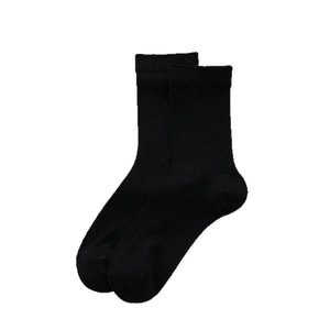 Simple black cotton crew socks with elastic ribbed cuffs shown in an overlapping layout