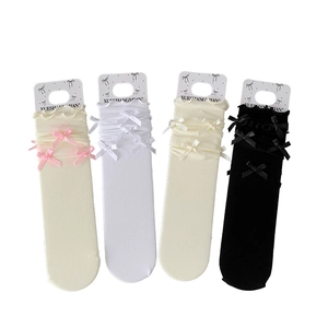 Japanese style ruffle socks with bows in white, beige, cream, and black colors