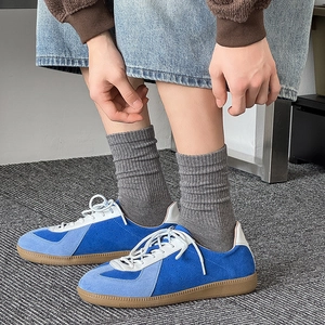 Classic blue suede German army trainers with premium gum sole and retro lace-up design