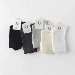 Detailed set of 5 pairs of cotton mid-calf socks in black, grey, beige, and white colors
