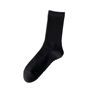 Minimalist black crew socks for men with premium ribbed texture on white background