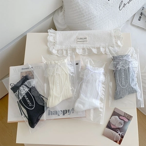 Lot de 4 paires de chaussettes en dentelle avec nœuds dans des pochettes individuelles