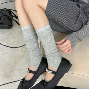 Grey vertical ribbed knitted leg warmers for women in a stylish balletcore aesthetic