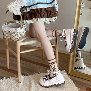 Detail of sweet Lolita platform shoes with bow and heart pattern lace crew socks