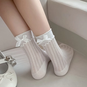 White mesh Lolita socks with ribbon bow and ruffled edge for a cute Japanese JK look