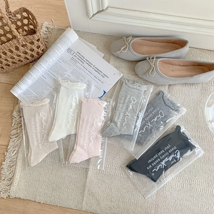 Set di sei paia di calze a rete traspiranti da donna in vari colori tenui stile Morandi