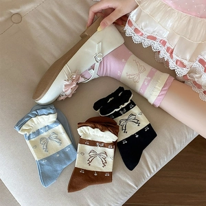 Vintage style slouch socks with cherry pattern and lace trim for a sweet look