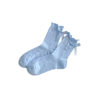 Light blue mesh knit socks with sweet ribbons and ruffled edges for a delicate JK style look