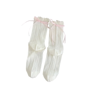White knee high socks with pink ribbons and hollow diamond knit lace trim