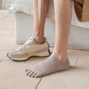 Detailed view of breathable five-finger invisible socks for men in khaki color