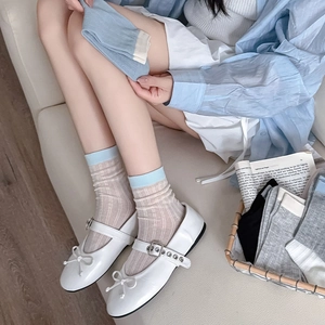 White Mary Jane shoes with bows and blue striped socks for a Japanese school style