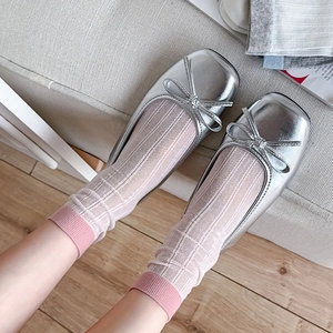 Silver square toe ballet flats with bow detail and striped socks in casual style