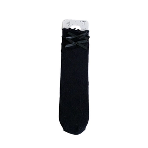 White card packaging for black knee high socks with elegant ribbon bow decorations