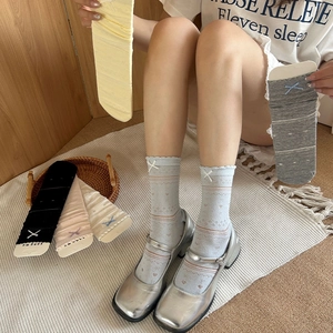 Lace ruffle ankle socks with heart patterns and bows in multiple pastel colors