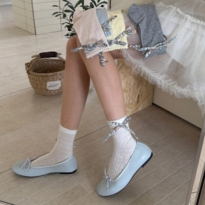 Chaussettes résille à fleurs avec nœud et motif ajouré vintage en plusieurs couleurs