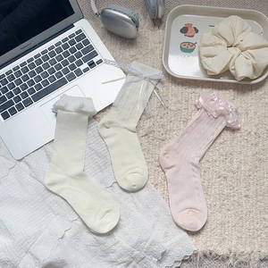 Lace ruffle ankle socks set in white and pink with mesh knit and bow details