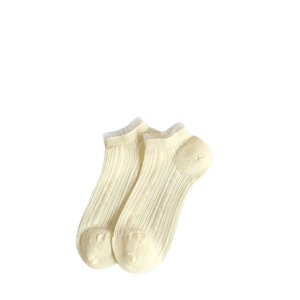 Creamy women ankle socks with delicate white lace trim and vertical ribbed knit texture