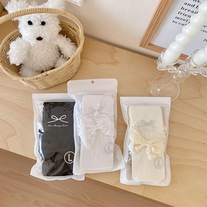 Lace bow hosiery set in black white and beige colors with individual packaging