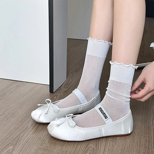 Elegant white satin ballet flats with round toe, bow detail, and branded elastic strap