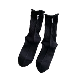 Elegant black knit crew socks with pearl accents and rolled edges in ballet style