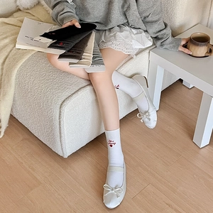 Detailed embroidery of Life is Journey text and red heart on high-quality cotton socks
