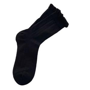 Cute black cotton ribbed mid-calf socks with sweet ruffle trim and mesh breathable texture