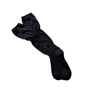 Classic black ribbed calf-length socks in ballet core style for a minimalist daily look